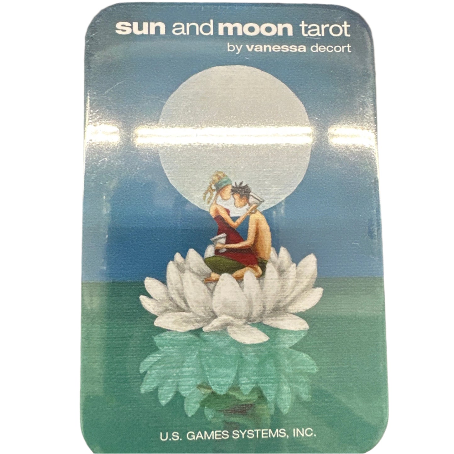 Sun and moon tarot in a tin