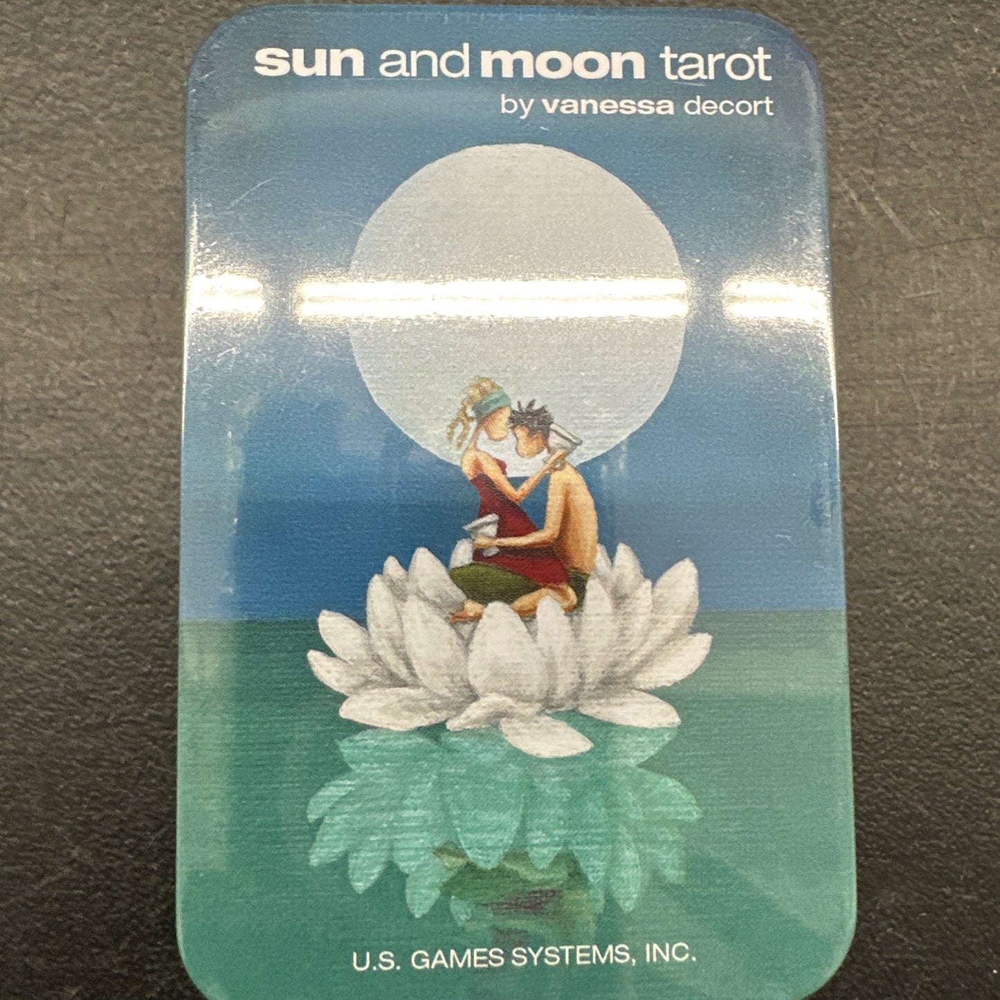 Sun and moon tarot in a tin