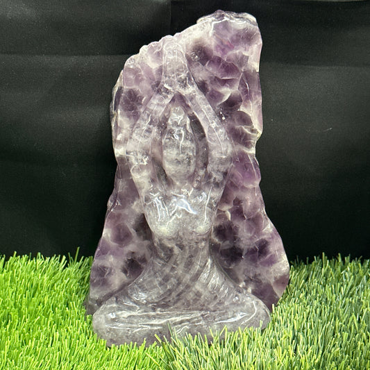 Buddha carved in Amethyst